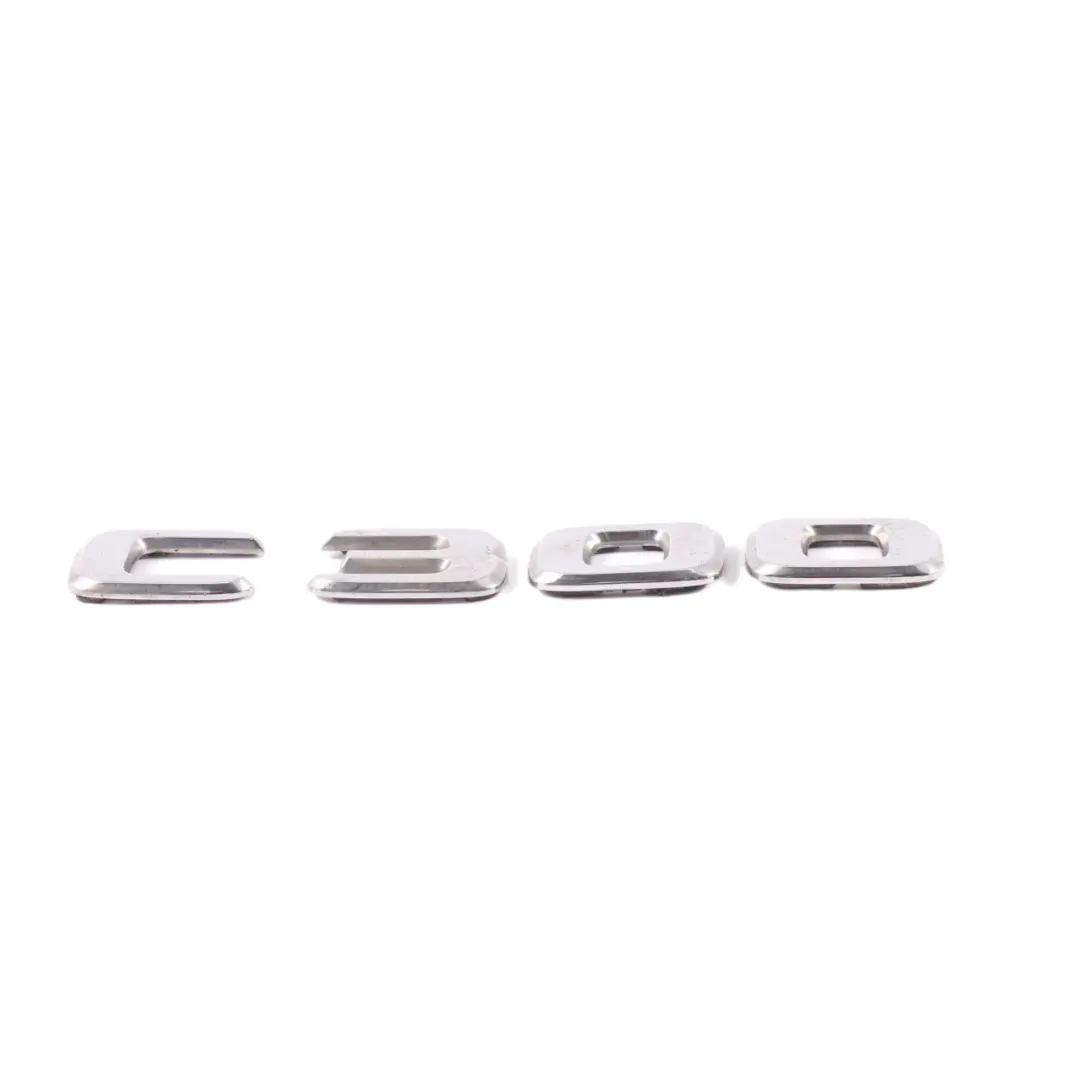 Mercedes W205 Emblemat Logo Klapy Bagażnika Tył Chrom A2058178500