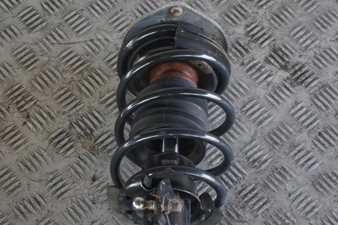 Mini R57 One N16 Delantero Izquierdo Muelle Puntal Suspension Pata Freno Buje