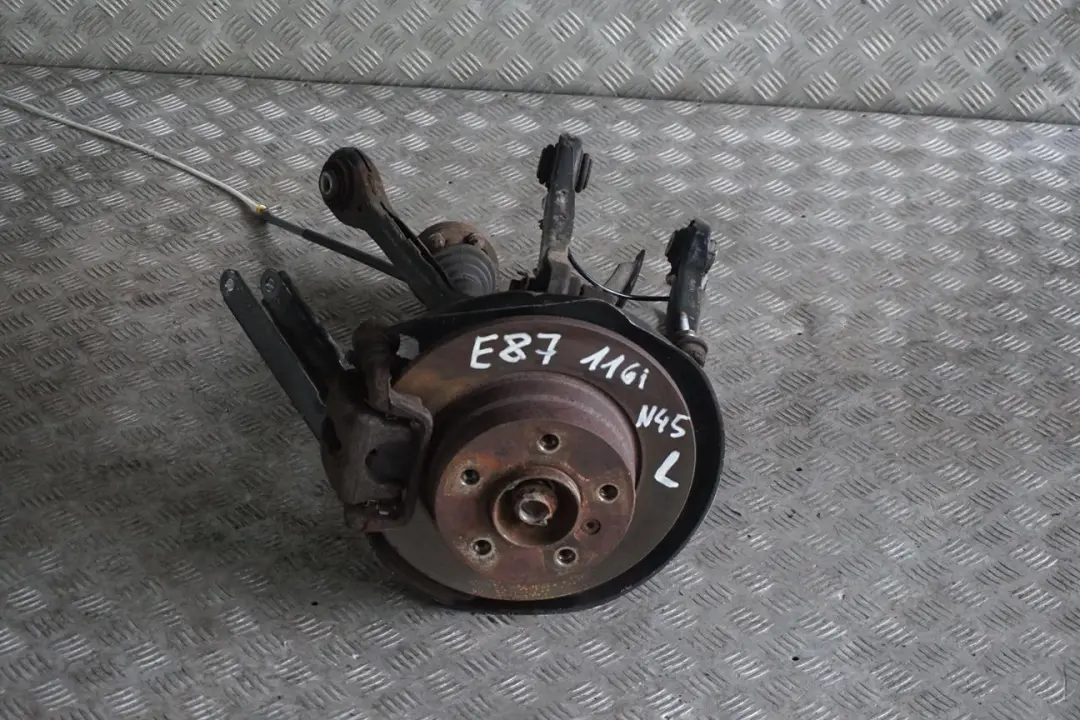 BMW E87 116i N45 Trasero Izquierdo Resorte Pierna Freno Calibre Suspension Hub