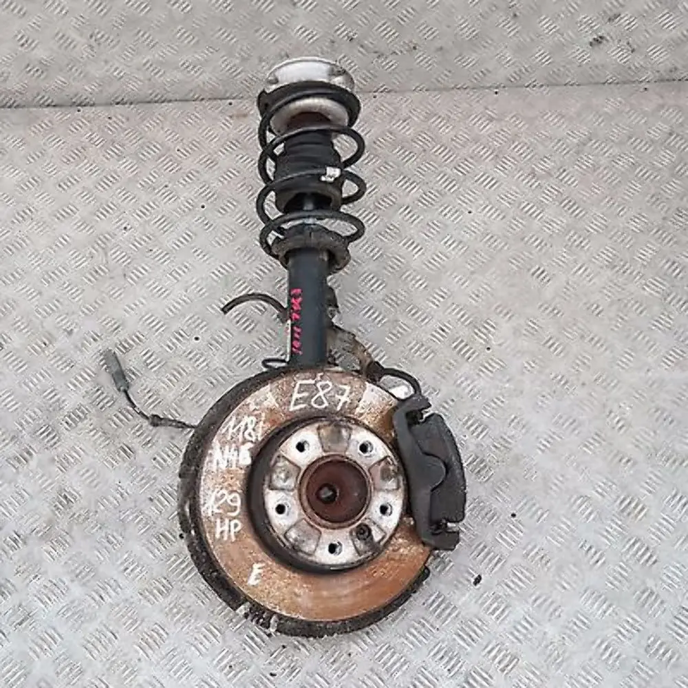 BMW E87 118i N46 Delantero Izquierdo Muelle Pata Suspensión Freno Buje