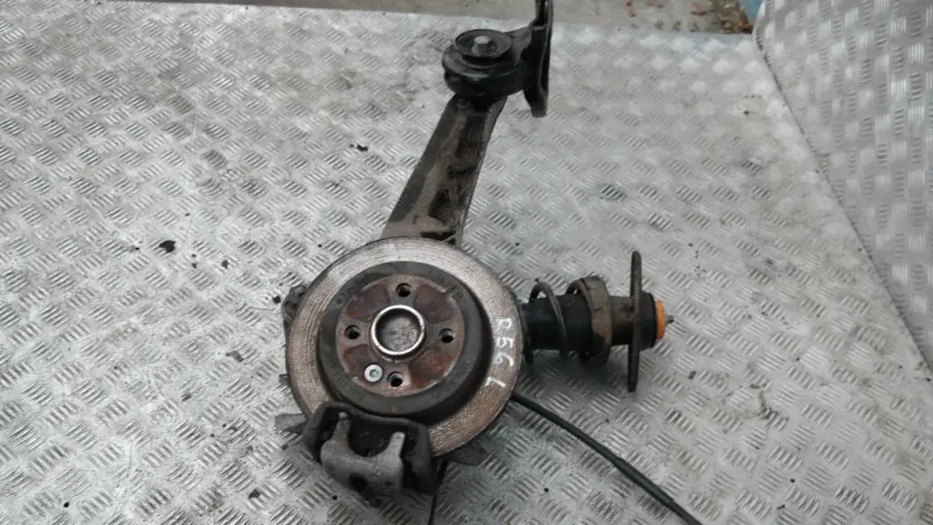 BMW Mini R56 One Coupé N12 REAR LEFT SPRING STRUT LEG BRAKE SUSPENSION HUB N/S