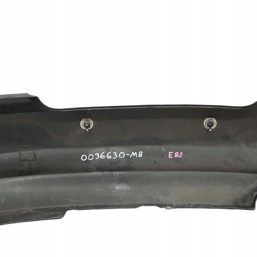 Zderzak tylny tył pdc schwarz do BMW E82 E88 o numerze 0036630 BMW E82 E88 Zderzak tylny tył pdc schwarz - SKU 0036630-MB - Numer Części 0036630