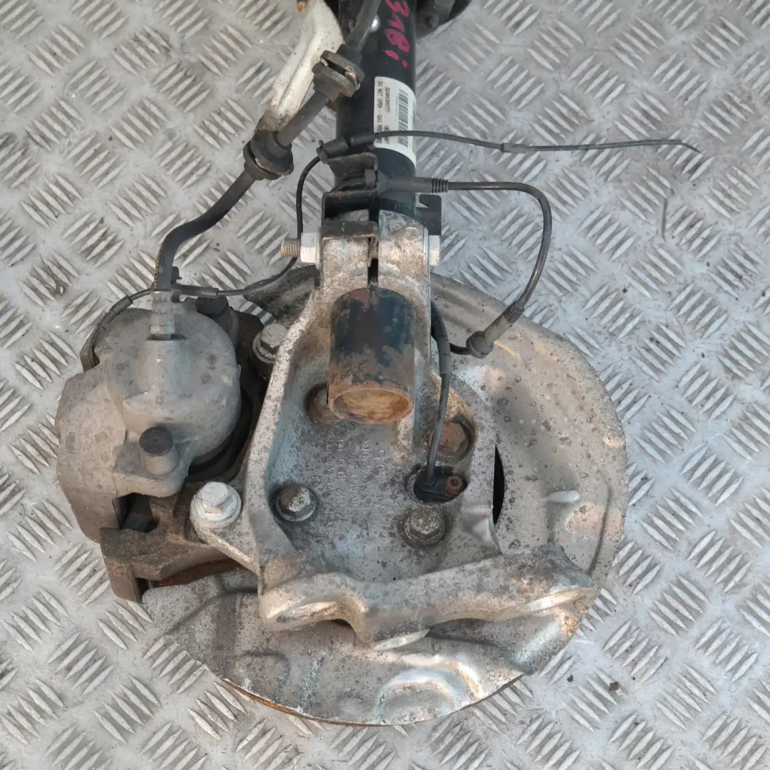 BMW 3 Series E91 318i FRONT LEFT N/S SPRING STRUT LEG SUSPENSION BRAKE CALLIPER - SKU 6772917 - Part number 31316772917