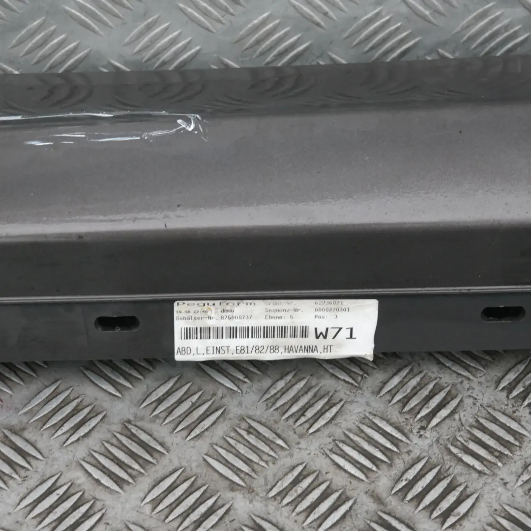 Bas de Porte Couverture Seuil A Gauche Havanna Metallique A17 pour BMW E81 E82 E88 à propos du numéro de pièce 36143 BMW E81 E82 E88 Bas de Porte Couverture Seuil A Gauche Havanna Metallique A17 - SKU 0036143-HAV - Numéro de pièce 36143