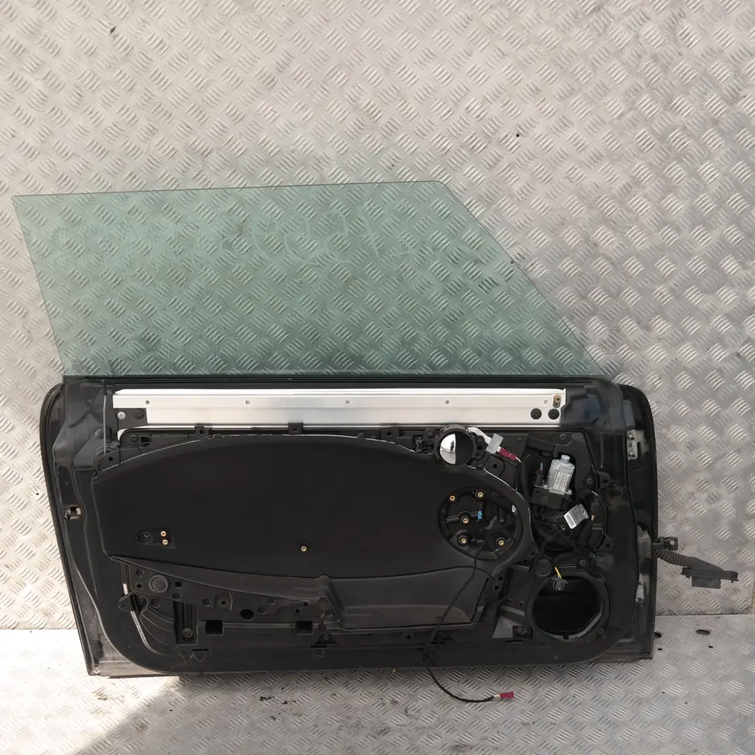 Drzwi lewe Astro Black A25 do MINI Cooper R56 o numerze 2755935 MINI Cooper R56 Drzwi lewe Astro Black A25 - SKU 2755935-ASB3 - Numer Części 2755935