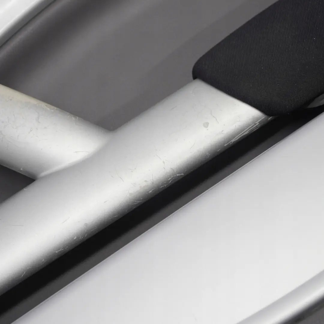 Türverkleidung Dekor Vorne Rechts Silber Grau Stoff Kaleido für BMW Mini R50 mit Teilenummer 7070592 BMW Mini R50 Türverkleidung Dekor Vorne Rechts Silber Grau Stoff Kaleido - SKU 7070592 - Teilenummer 7070592