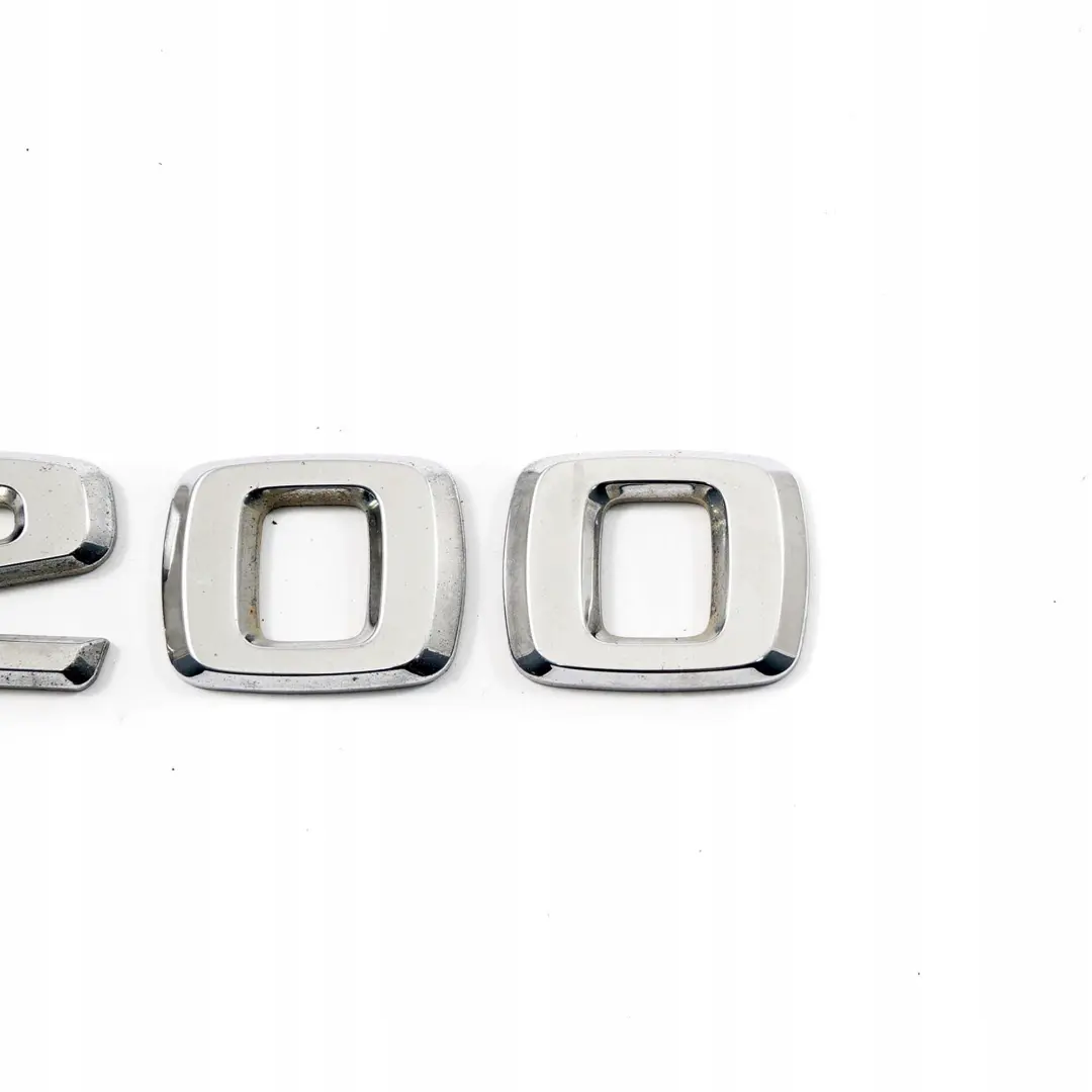 Mercedes-Benz Classe B W245 Stemma Posteriore Scritta Logo B200 per con numero di parte A1698171315 Mercedes-Benz Classe B W245 Stemma Posteriore Scritta Logo B200 - SKU A1698171315 - Numero di parte A1698171315