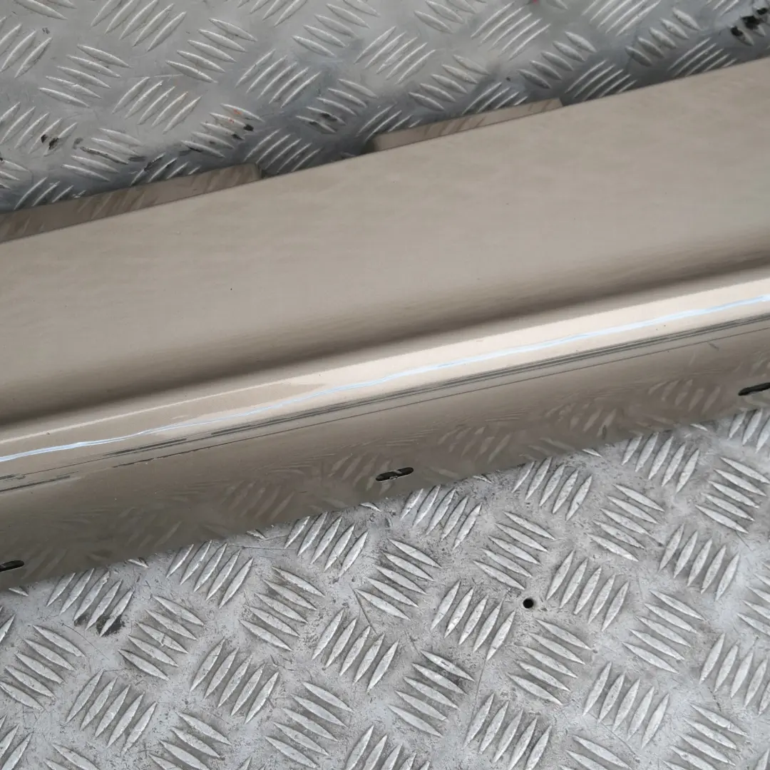 Sill Strip Faldón Lateral Izquierdo Sonora Metallic - A23 para BMW E87 con número de pieza 51770032949 BMW E87 Sill Strip Faldón Lateral Izquierdo Sonora Metallic - A23 - SKU 0032949-SON - Número de pieza 51770032949