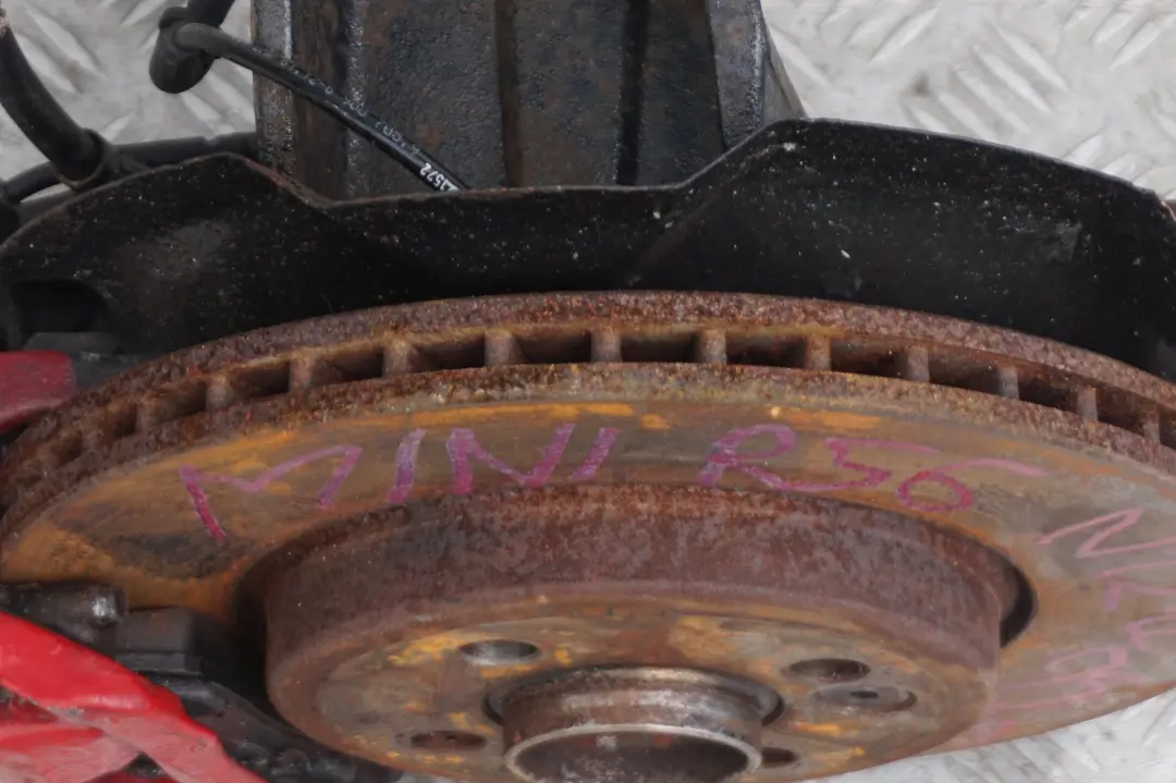 Suspensión Delantera Izquierda Pata Freno Pinza Disco para Mini Cooper R56 N12 1.4 con número de pieza 6778335 Mini Cooper R56 N12 1.4 Suspensión Delantera Izquierda Pata Freno Pinza Disco - SKU 6778335 - Número de pieza 6778335