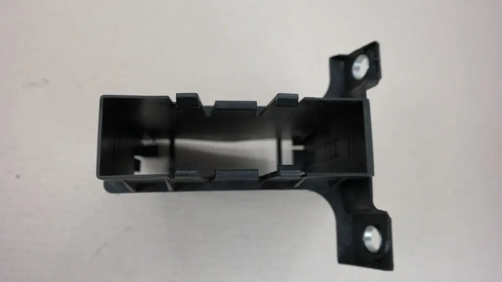 Holder DC/DC Converter to Mini Cooper R55 R56 R57 R59 LCI Cover with Part number 2757521 Mini Cooper R55 R56 R57 R59 LCI Cover Holder DC/DC Converter - SKU 2757521 - Part number 2757521