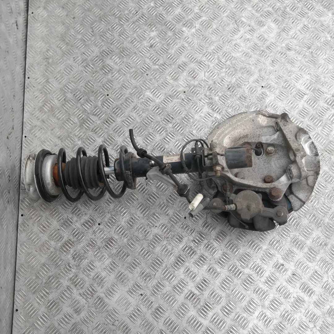 Delantero Izquierdo Muelle Strut Freno Suspension Pata Buje BMW E87 LCI 118i - SKU 6771553-2 - Número de pieza 31316771553
