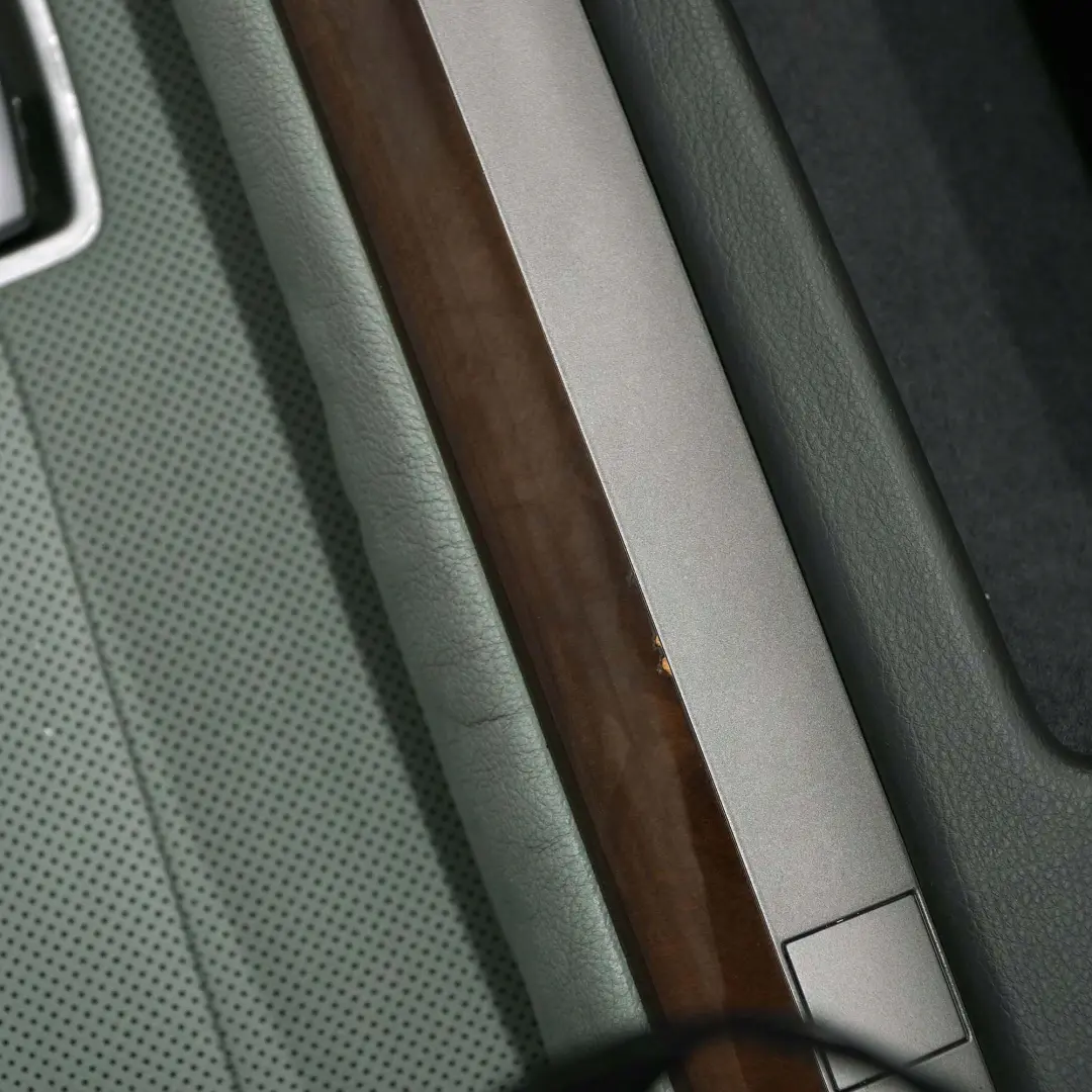 Türverkleidung Abdeckung Vorne Links Leder Nasca Gruen für BMW 7 er E65 E66 mit Teilenummer 7142669 BMW 7 er E65 E66 Türverkleidung Abdeckung Vorne Links Leder Nasca Gruen - SKU 7142669 - Teilenummer 7142669