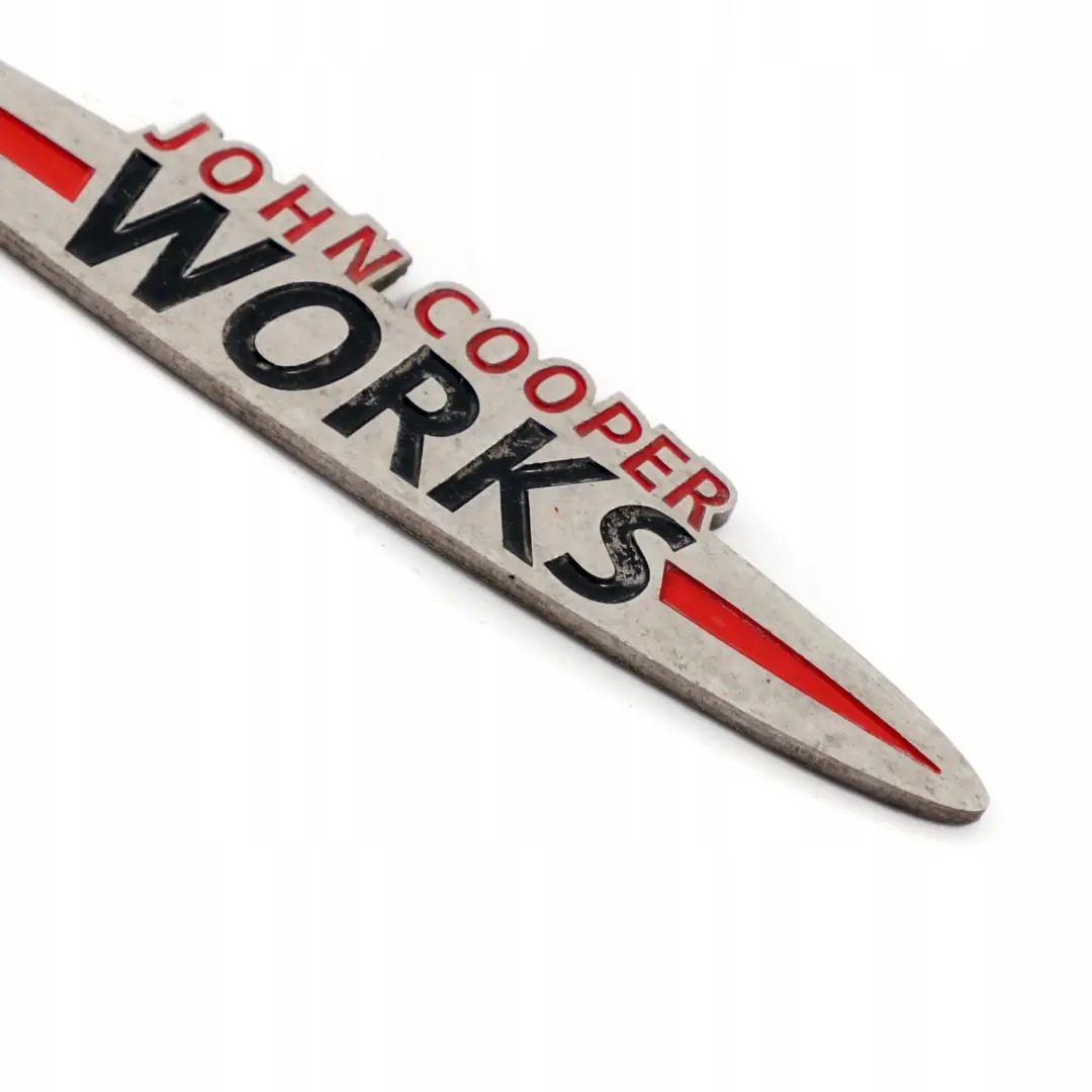 Emblema Logo Timbro Distintivo per Mini Cooper S JCW John Cooper Works con numero di parte JCW Emblem Mini Cooper S JCW John Cooper Works Emblema Logo Timbro Distintivo - SKU JCW-Emblem - Numero di parte JCW Emblem