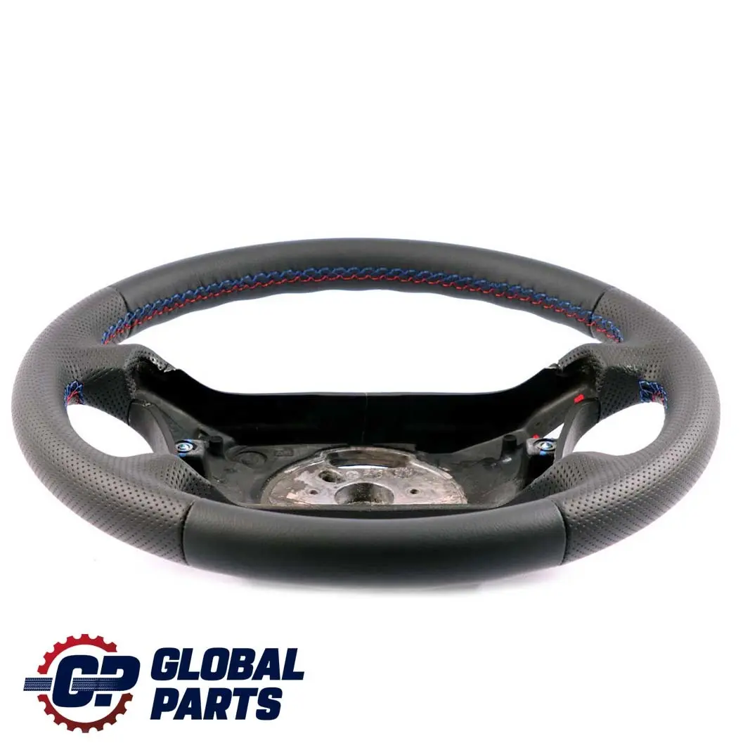 Nuova Pelle Nera Volante 4 Raggi M-Tricolori per BMW X3 E83 con numero di parte 3411790 BMW X3 E83 Nuova Pelle Nera Volante 4 Raggi M-Tricolori - SKU 3411790-1 - Numero di parte 3411790