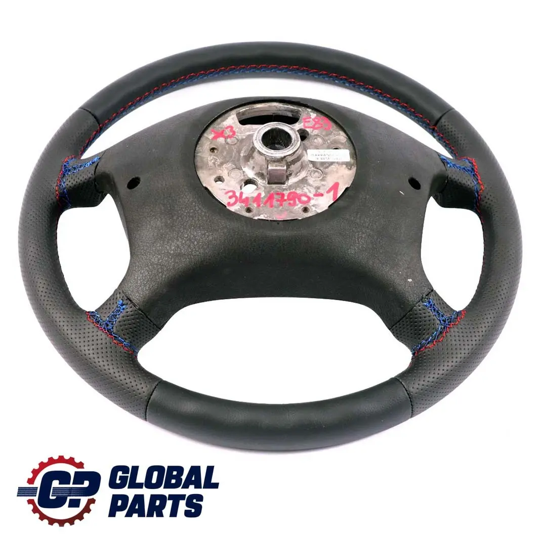 Nuova Pelle Nera Volante 4 Raggi M-Tricolori per BMW X3 E83 con numero di parte 3411790 BMW X3 E83 Nuova Pelle Nera Volante 4 Raggi M-Tricolori - SKU 3411790-1 - Numero di parte 3411790