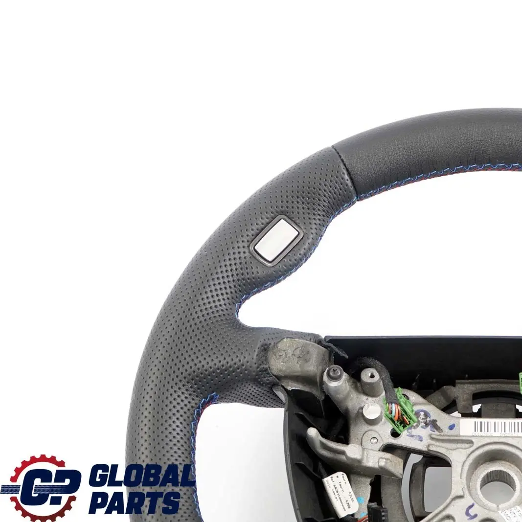 NUOVO Volante in pelle nero M Tricolore per BMW Serie 7 E65 con numero di parte 6761743 BMW Serie 7 E65 NUOVO Volante in pelle nero M Tricolore - SKU 6761743-1 - Numero di parte 6761743