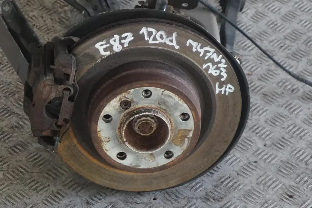 BMW E87 120d M47N2 Zwrotnica półoś lewa 163HP - SKU 6774809-14 - Numer Części 6774809
