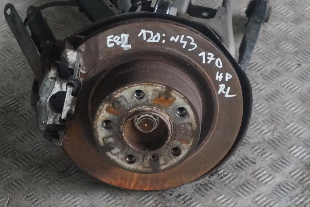 N43 Trasera Izquierda Primavera Strut Pierna Freno Suspension Hub para BMW E82 120i con número de pieza 6774809 BMW E82 120i N43 Trasera Izquierda Primavera Strut Pierna Freno Suspension Hub - SKU 6774809-11 - Número de pieza 6774809