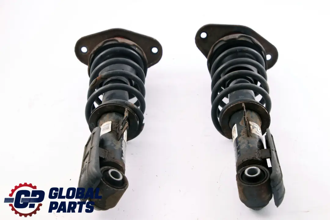 Left Right Spring Shock Absorber Set to Mini R56 Cooper S N14 Rear with Part number 6853965 Mini R56 Cooper S N14 Rear Left Right Spring Shock Absorber Set - SKU 6853965-3 - Part number 6853965