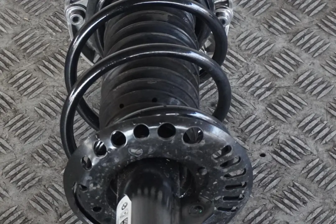 B38C Front Right O/S Suspension Leg Spring Strut Hub to BMW 1 Series F40 118i with Part number 6877058 BMW 1 Series F40 118i B38C Front Right O/S Suspension Leg Spring Strut Hub - SKU 6877058 - Part number 6877058