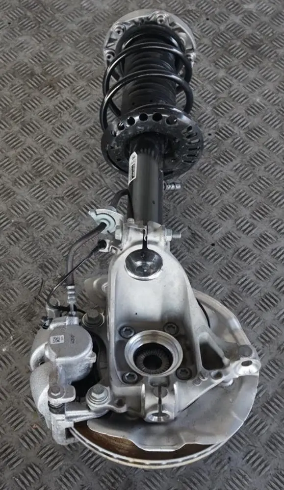 B38C Front Right O/S Suspension Leg Spring Strut Hub to BMW 1 Series F40 118i with Part number 6877058 BMW 1 Series F40 118i B38C Front Right O/S Suspension Leg Spring Strut Hub - SKU 6877058 - Part number 6877058