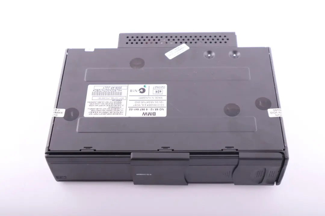 Cambiador 6 CD con cargador BMW E81 E87 E90 E91 E92 - SKU 6967641 - Número de pieza 6967641