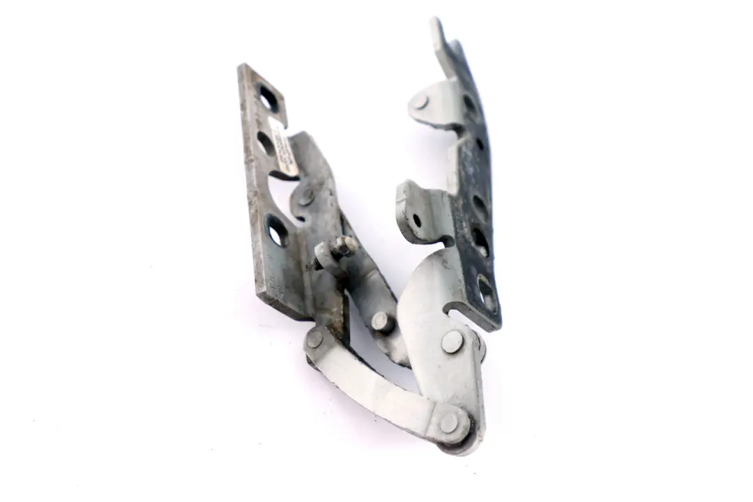 Zawias maski lewy titan silver 8402173 do BMW E53 X5 o numerze 7006123 BMW E53 X5 Zawias maski lewy titan silver 8402173 - SKU 7006123-TS - Numer Części 7006123