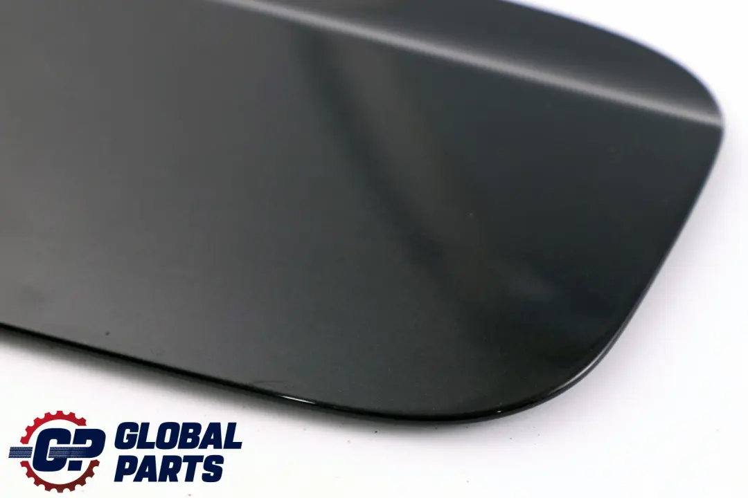 Fill In Flap Fuel Filler Cover Black Sapphire Metallic to BMW 7 Series E65 E66 E67 with Part number 7010539 BMW 7 Series E65 E66 E67 Fill In Flap Fuel Filler Cover Black Sapphire Metallic - SKU 7010539-BS - Part number 7010539