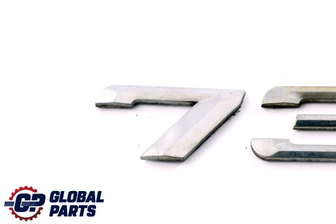 Boot Trunk Lid Adhered Lettering Emblem Logo 735i to BMW 7 Series E65 Rear with Part number 7033218 BMW 7 Series E65 Rear Boot Trunk Lid Adhered Lettering Emblem Logo 735i - SKU 7033218 - Part number 7033218