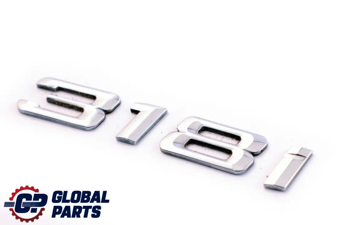 Emblemat Klapy Bagażnika Napis Znaczek 318i Tył do BMW E90 o numerze 7039787 BMW E90 Emblemat Klapy Bagażnika Napis Znaczek 318i Tył - SKU 7157553 - Numer Części 7039787