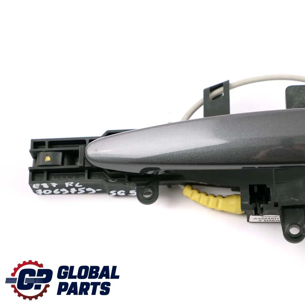 Asidero Trasero Izquierdo Completo Sparkling Graphite A22 para BMW E87 con número de pieza 7069759 BMW E87 Asidero Trasero Izquierdo Completo Sparkling Graphite A22 - SKU 7069759-SG5 - Número de pieza 7069759