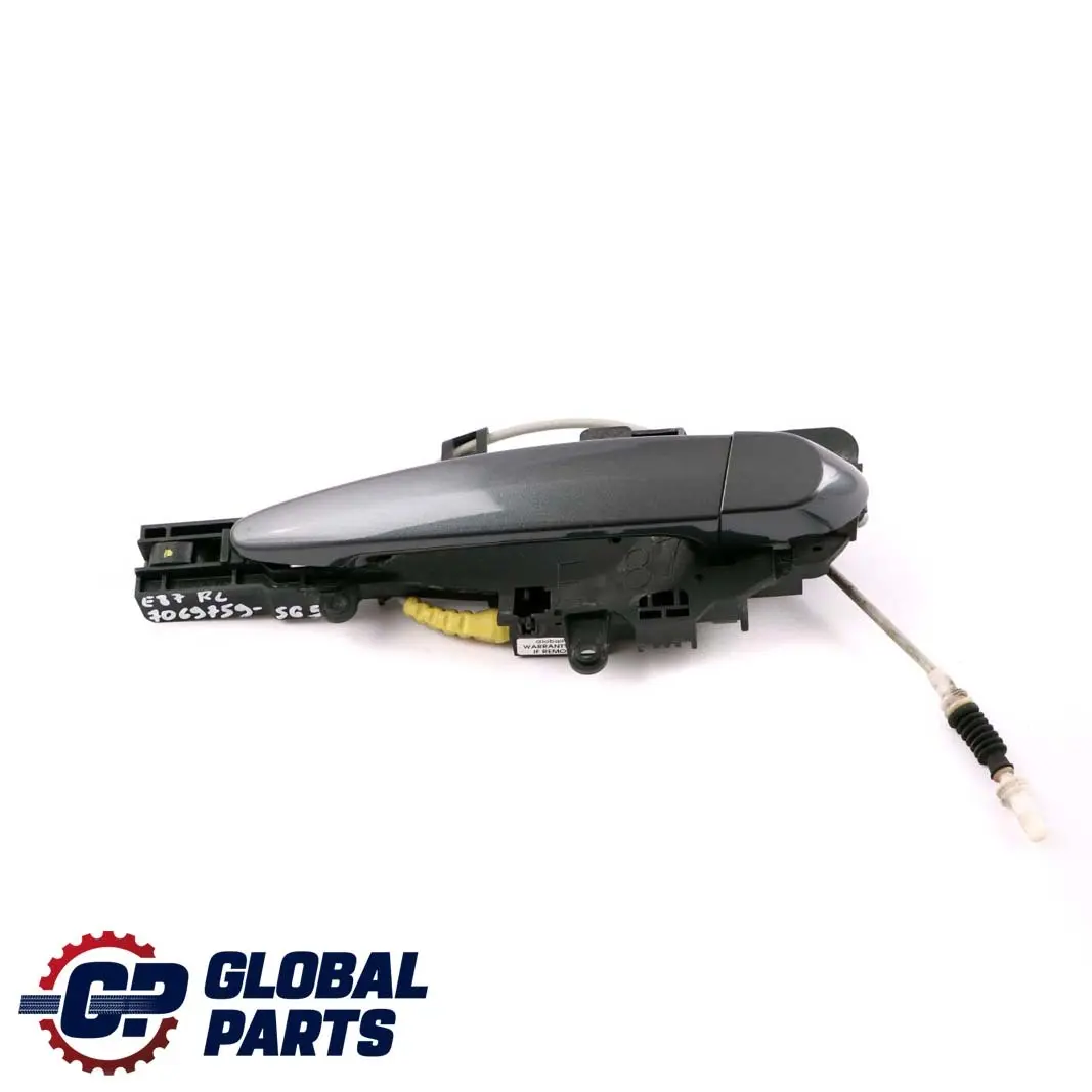 Asidero Trasero Izquierdo Completo Sparkling Graphite A22 para BMW E87 con número de pieza 7069759 BMW E87 Asidero Trasero Izquierdo Completo Sparkling Graphite A22 - SKU 7069759-SG5 - Número de pieza 7069759