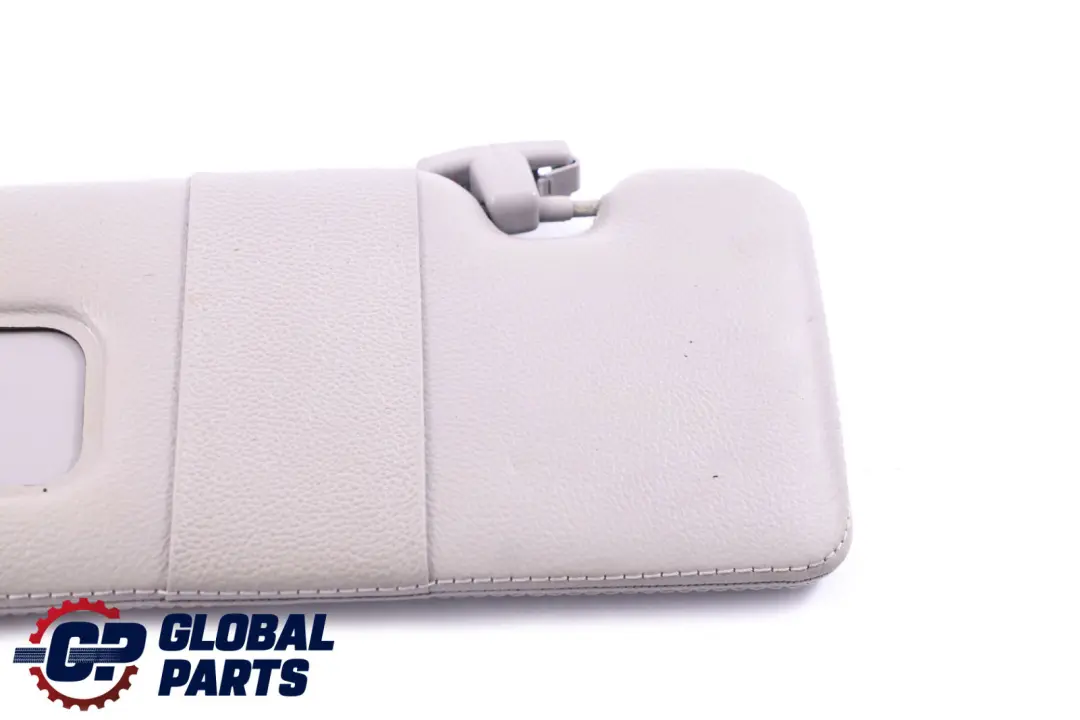 Sonnenblende Make-Up-Leuchte Links Himmelgrau für BMW 6 er E63 mit Teilenummer 7121011 BMW 6 er E63 Sonnenblende Make-Up-Leuchte Links Himmelgrau - SKU 7121011 - Teilenummer 7121011