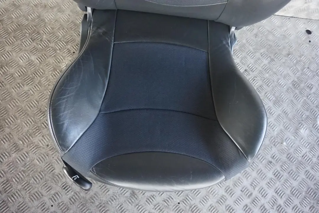 £BMW Mini Cooper R52 Cabrio Front Right O/S Cloth / Leather Seat Panther Black to with Part number 7130084 £BMW Mini Cooper R52 Cabrio Front Right O/S Cloth / Leather Seat Panther Black - SKU 7130084-1 - Part number 7130084