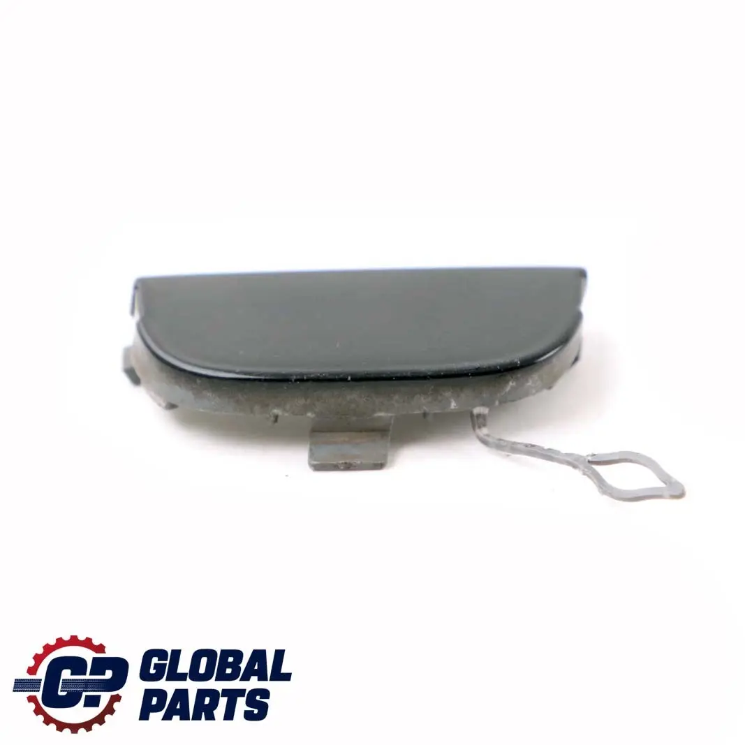 Flap Towing Eye Front Bumper Midnight Black A94 to BMW Mini R55 R56 Cover with Part number 7147850 BMW Mini R55 R56 Cover Flap Towing Eye Front Bumper Midnight Black A94 - SKU 7147850-MNB - Part number 7147850