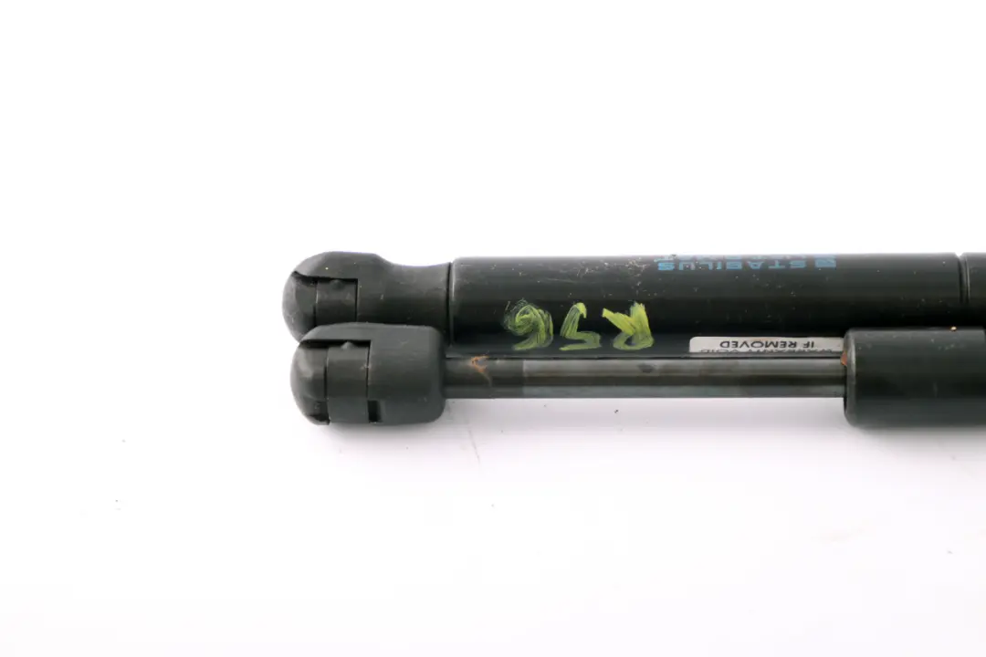 Par Muelle Capo Struts Elevadores para Mini Cooper R56 R55 R57 R58 con número de pieza 7148864 Mini Cooper R56 R55 R57 R58 Par Muelle Capo Struts Elevadores - SKU 7148864-1 - Número de pieza 7148864