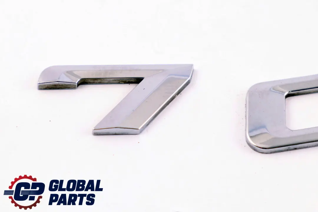 Napis Logo Emblemat Bagażnika 740i do BMW E65 o numerze 7154497 BMW E65 Napis Logo Emblemat Bagażnika 740i - SKU 7154497 - Numer Części 7154497