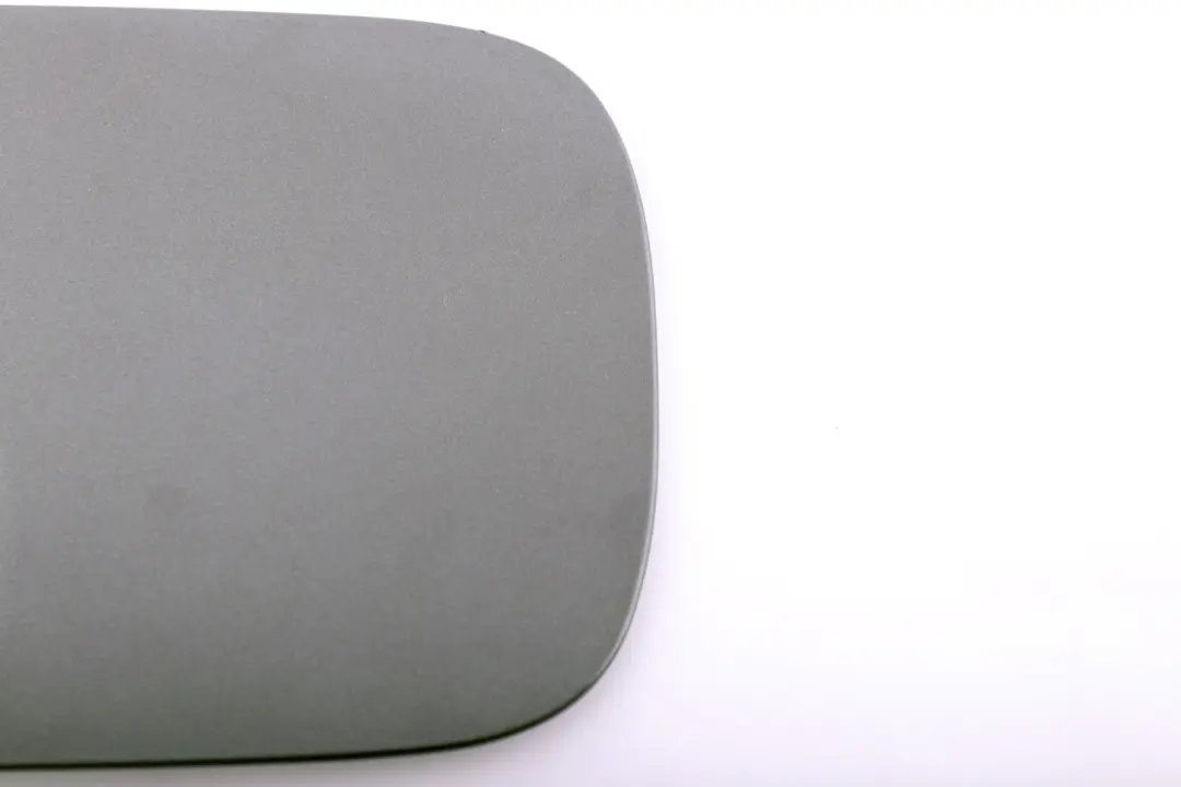 Fill In Flap Fuel Cover Sparkling Graphite to BMW E82 E88 with Part number 7166825 BMW E82 E88 Fill In Flap Fuel Cover Sparkling Graphite - SKU 7166825-SG - Part number 7166825