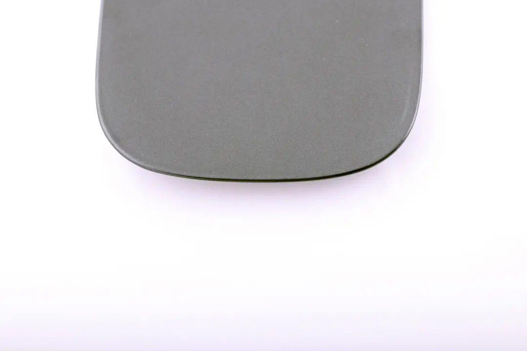 Fill In Flap Fuel Cover Sparkling Graphite to BMW E82 E88 with Part number 7166825 BMW E82 E88 Fill In Flap Fuel Cover Sparkling Graphite - SKU 7166825-SG - Part number 7166825