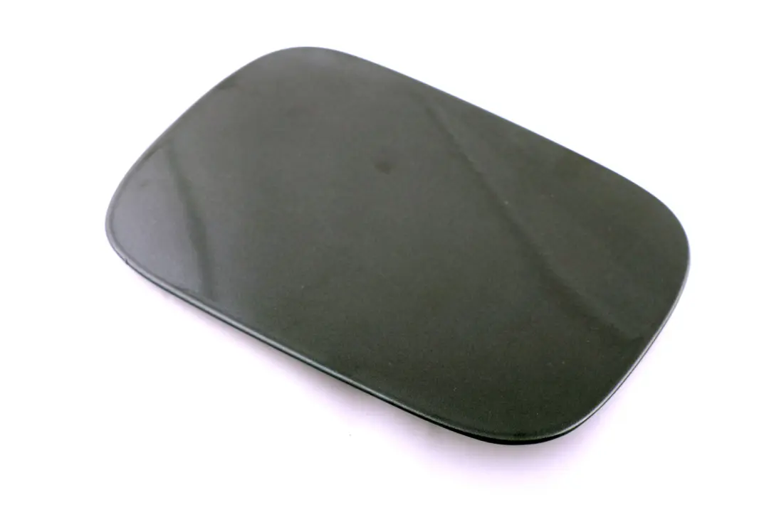 Fill In Flap Fuel Cover Sparkling Graphite to BMW E82 E88 with Part number 7166825 BMW E82 E88 Fill In Flap Fuel Cover Sparkling Graphite - SKU 7166825-SG - Part number 7166825