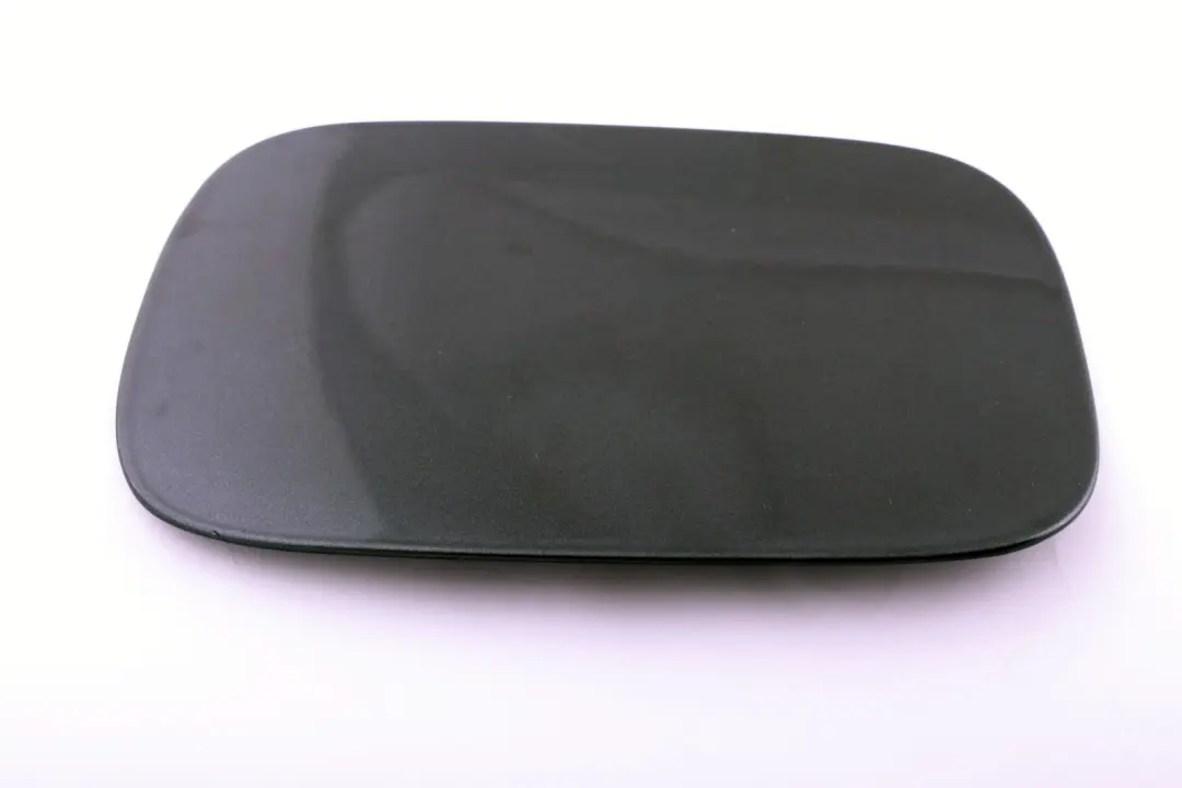 Fill In Flap Fuel Cover Sparkling Graphite to BMW E82 E88 with Part number 7166825 BMW E82 E88 Fill In Flap Fuel Cover Sparkling Graphite - SKU 7166825-SG - Part number 7166825