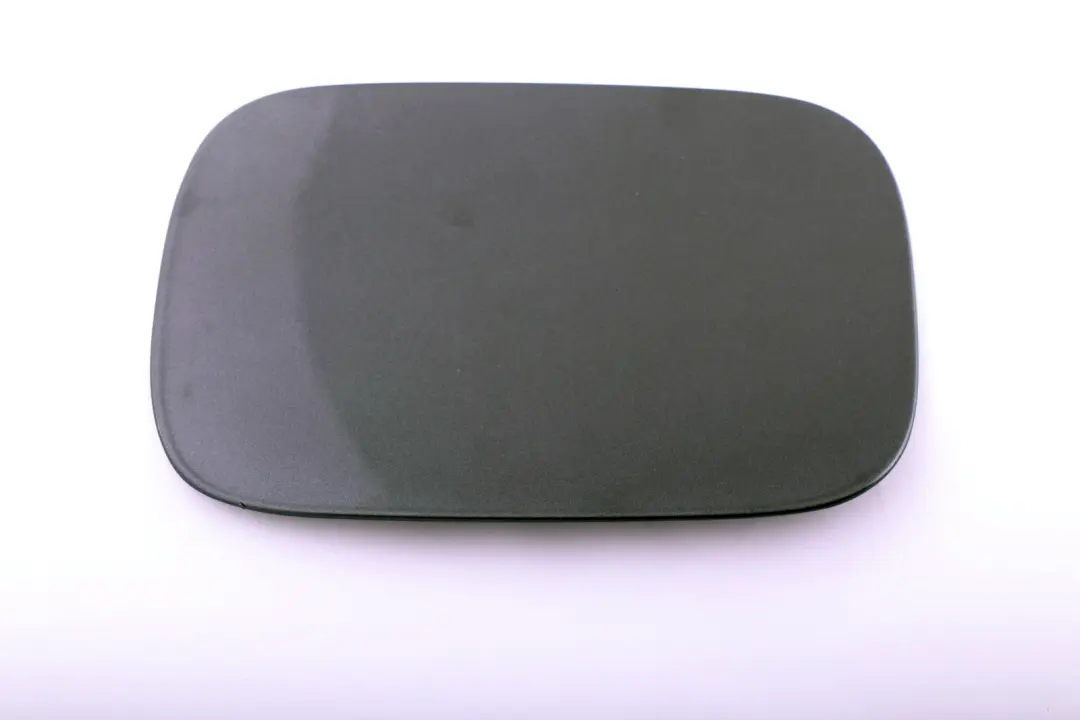 Fill In Flap Fuel Cover Sparkling Graphite to BMW E82 E88 with Part number 7166825 BMW E82 E88 Fill In Flap Fuel Cover Sparkling Graphite - SKU 7166825-SG - Part number 7166825