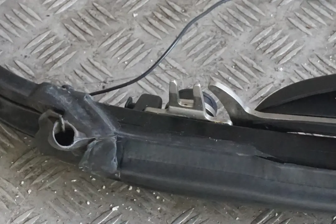 Folding Top Roof Tensioner Holder to Mini R52 with Part number 7174766 Mini R52 Folding Top Roof Tensioner Holder - SKU 7174766 - Part number 7174766