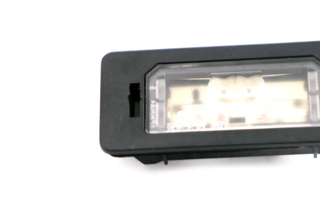 Number Plate LED Light BMW E71 E84 E90 E91 E92 F10 F30 Lamp Unit to with Part number 7193293 Number Plate LED Light BMW E71 E84 E90 E91 E92 F10 F30 Lamp Unit - SKU 7193293 - Part number 7193293