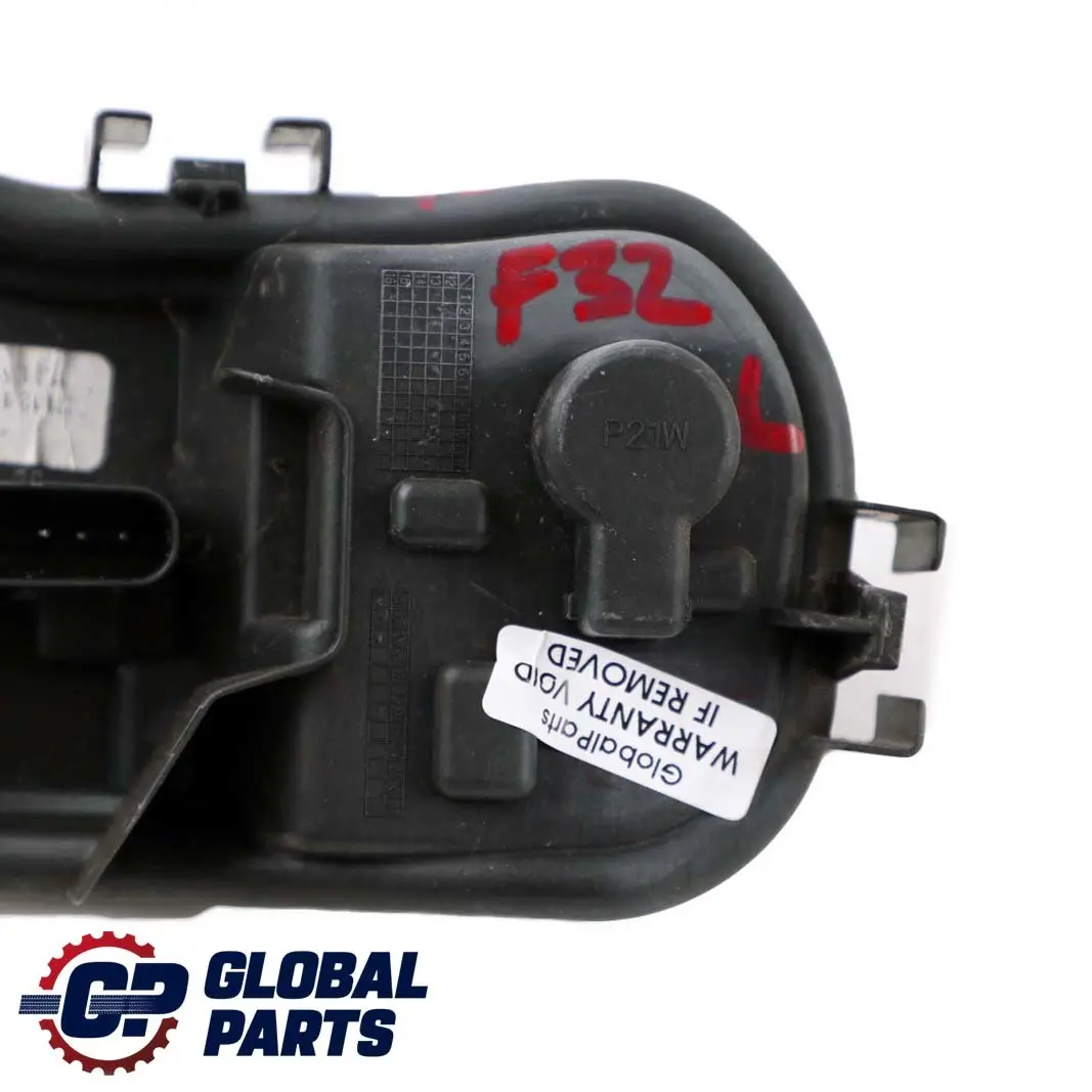Soporte Bombilla Luz Panel Lateral Trasero Izquierdo para BMW F32 con número de pieza 7366065 BMW F32 Soporte Bombilla Luz Panel Lateral Trasero Izquierdo - SKU 7366065 - Número de pieza 7366065