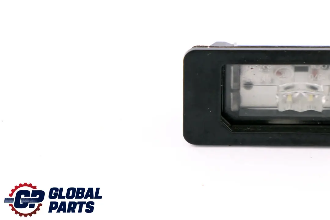 Luz de matrícula Touring para BMW F40 G30 con número de pieza 7410302 BMW F40 G30 Luz de matrícula Touring - SKU 7410302 - Número de pieza 7410302