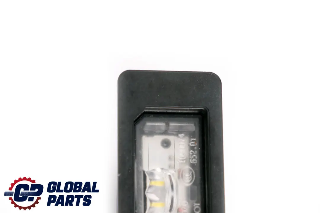 Luz de matrícula Touring para BMW F40 G30 con número de pieza 7410302 BMW F40 G30 Luz de matrícula Touring - SKU 7410302 - Número de pieza 7410302