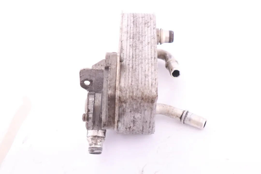 Chłodnica Chłodniczka Oleju Skrzyni Automat 7521064 do BMW E87 E88 E90 E93 o numerze 7529499 BMW E87 E88 E90 E93 Chłodnica Chłodniczka Oleju Skrzyni Automat 7521064 - SKU 7529499 - Numer Części 7529499