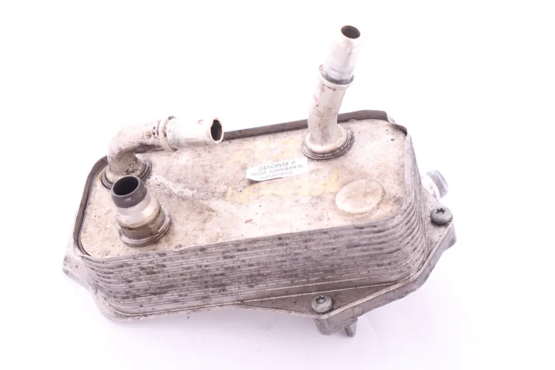 Chłodnica Chłodniczka Oleju Skrzyni Automat 7521064 do BMW E87 E88 E90 E93 o numerze 7529499 BMW E87 E88 E90 E93 Chłodnica Chłodniczka Oleju Skrzyni Automat 7521064 - SKU 7529499 - Numer Części 7529499