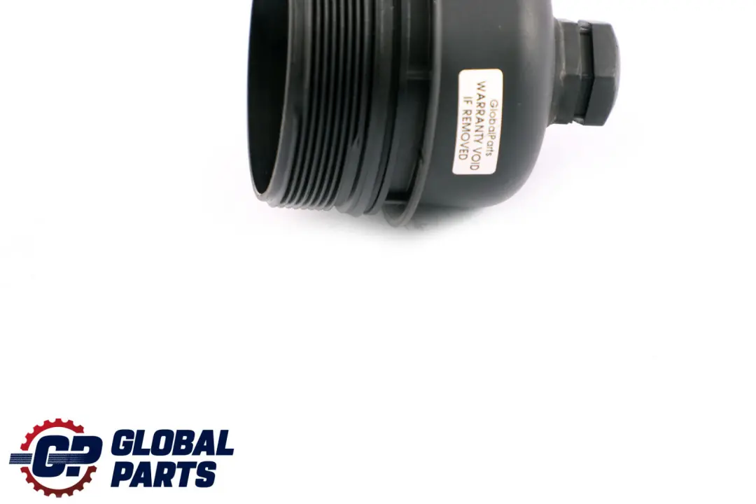 Oil Filter Cover to Mini Cooper R55 R56 Petrol Engine with Part number 7805979 Mini Cooper R55 R56 Petrol Engine Oil Filter Cover - SKU 7805979 - Part number 7805979